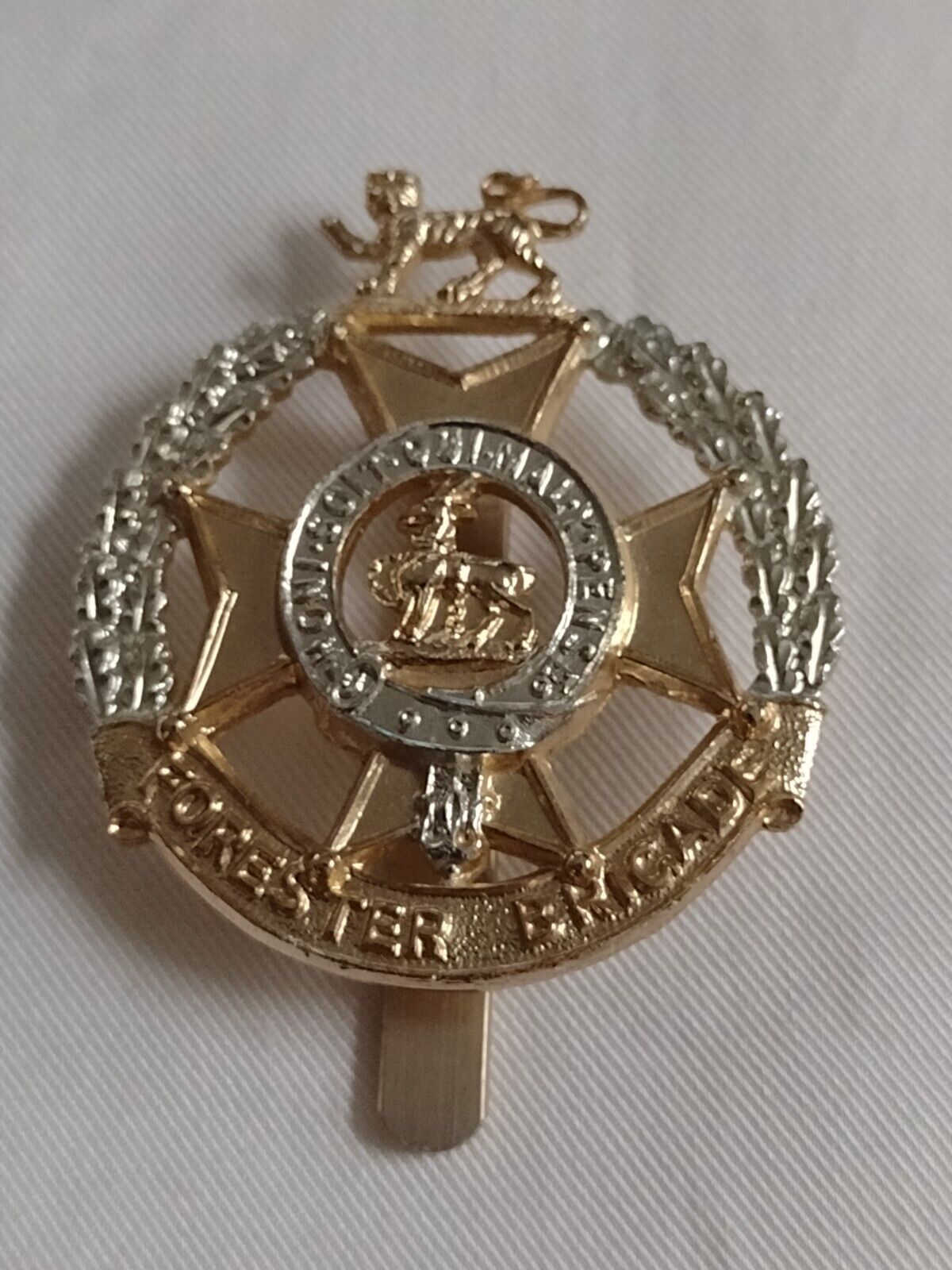 Staybrite Forester Brigade Cap Badge Slider maker JR Gaunt Anodised Aluminium Main Image