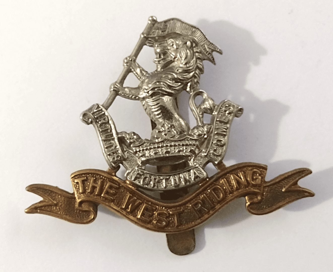 WW1 Duke of Wellington's (West Riding) Regt Cap Badge Bi-Metal Antique- Original Main Image